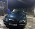 Зелений Мазда Кседос 9, об'ємом двигуна 2 л та пробігом 2 тис. км за 1806 $, фото 1 на Automoto.ua