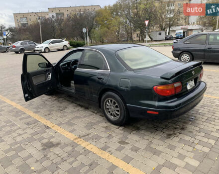 Зелений Мазда Кседос 9, об'ємом двигуна 2.5 л та пробігом 394 тис. км за 2200 $, фото 17 на Automoto.ua