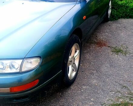 Зеленый Мазда Кседос 9, объемом двигателя 2.3 л и пробегом 255 тыс. км за 1400 $, фото 2 на Automoto.ua