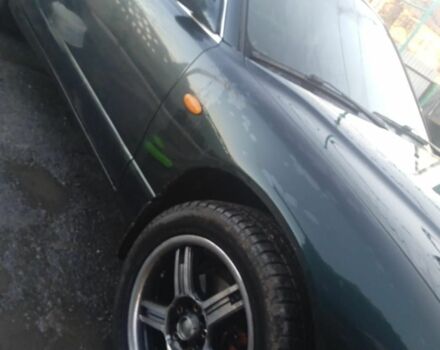 Зеленый Мазда Кседос 9, объемом двигателя 2.5 л и пробегом 1000 тыс. км за 2500 $, фото 2 на Automoto.ua