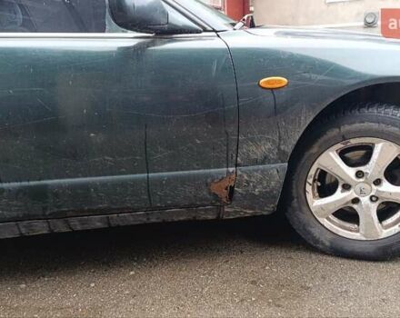 Зеленый Мазда Кседос 9, объемом двигателя 2.5 л и пробегом 354 тыс. км за 1500 $, фото 5 на Automoto.ua