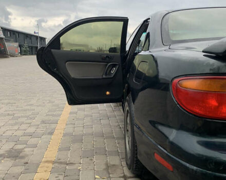 Зелений Мазда Кседос 9, об'ємом двигуна 2.5 л та пробігом 394 тис. км за 2200 $, фото 26 на Automoto.ua