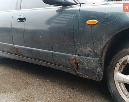 Зеленый Мазда Кседос 9, объемом двигателя 2.5 л и пробегом 354 тыс. км за 1500 $, фото 1 на Automoto.ua