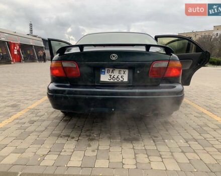 Зелений Мазда Кседос 9, об'ємом двигуна 2.5 л та пробігом 394 тис. км за 2200 $, фото 10 на Automoto.ua