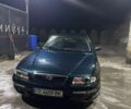 Зелений Мазда Кседос 9, об'ємом двигуна 2 л та пробігом 235 тис. км за 1806 $, фото 1 на Automoto.ua