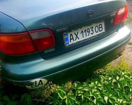 Зеленый Мазда Кседос 9, объемом двигателя 2.3 л и пробегом 255 тыс. км за 1400 $, фото 3 на Automoto.ua