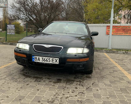 Зелений Мазда Кседос 9, об'ємом двигуна 2.5 л та пробігом 394 тис. км за 2200 $, фото 19 на Automoto.ua