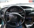 Зеленый Мазда Кседос 9, объемом двигателя 2 л и пробегом 285 тыс. км за 3353 $, фото 1 на Automoto.ua