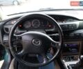 Зеленый Мазда Кседос 9, объемом двигателя 2 л и пробегом 285 тыс. км за 3336 $, фото 1 на Automoto.ua