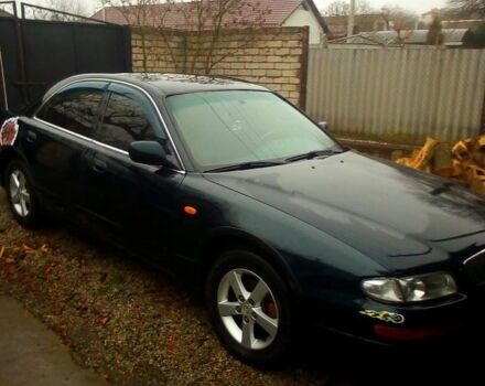 Зеленый Мазда Кседос 9, объемом двигателя 2 л и пробегом 300 тыс. км за 2300 $, фото 1 на Automoto.ua