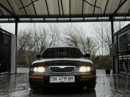 Зелений Мазда Кседос 9, об'ємом двигуна 2.5 л та пробігом 360 тис. км за 2700 $, фото 1 на Automoto.ua