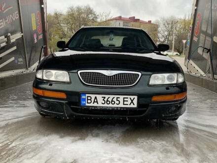 Зеленый Мазда Кседос 9, объемом двигателя 2.5 л и пробегом 394 тыс. км за 2200 $, фото 1 на Automoto.ua