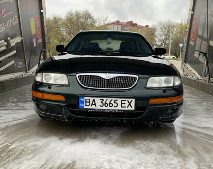 Зеленый Мазда Кседос 9, объемом двигателя 2.5 л и пробегом 394 тыс. км за 2200 $, фото 1 на Automoto.ua