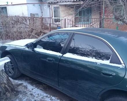 Зеленый Мазда Кседос 9, объемом двигателя 2.5 л и пробегом 100 тыс. км за 2600 $, фото 1 на Automoto.ua