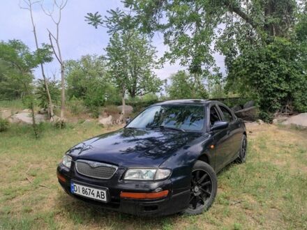 Мазда Кседос 9 1995 у Никополе на Automoto.ua Помаранчевий Мазда Кседос 9, об'ємом двигуна 2.5 л та пробігом 260 тис. км за 2450 $, фото 1 на Automoto.ua