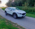 Белый Мазда CX-30, объемом двигателя 2 л и пробегом 115 тыс. км за 18300 $, фото 1 на Automoto.ua