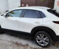 Белый Мазда CX-30, объемом двигателя 2.5 л и пробегом 106 тыс. км за 18800 $, фото 2 на Automoto.ua