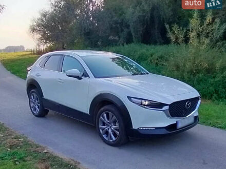 Белый Мазда CX-30, объемом двигателя 2 л и пробегом 115 тыс. км за 18300 $, фото 1 на Automoto.ua