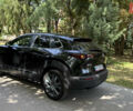 Черный Мазда CX-30, объемом двигателя 2.49 л и пробегом 102 тыс. км за 18200 $, фото 2 на Automoto.ua