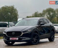 Черный Мазда CX-30, объемом двигателя 2.49 л и пробегом 106 тыс. км за 20900 $, фото 1 на Automoto.ua