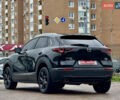 Черный Мазда CX-30, объемом двигателя 2.49 л и пробегом 106 тыс. км за 20900 $, фото 7 на Automoto.ua