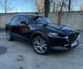 Черный Мазда CX-30, объемом двигателя 2.49 л и пробегом 65 тыс. км за 20400 $, фото 1 на Automoto.ua