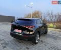 Черный Мазда CX-30, объемом двигателя 2.5 л и пробегом 8 тыс. км за 25000 $, фото 3 на Automoto.ua