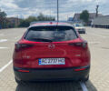 Красный Мазда CX-30, объемом двигателя 2.49 л и пробегом 70 тыс. км за 20000 $, фото 41 на Automoto.ua