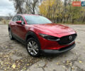 Красный Мазда CX-30, объемом двигателя 2.5 л и пробегом 57 тыс. км за 20125 $, фото 1 на Automoto.ua