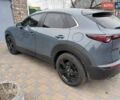 Серый Мазда CX-30, объемом двигателя 2 л и пробегом 105 тыс. км за 22500 $, фото 2 на Automoto.ua