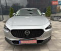 Серый Мазда CX-30, объемом двигателя 2 л и пробегом 155 тыс. км за 16500 $, фото 1 на Automoto.ua