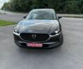 Серый Мазда CX-30, объемом двигателя 2.5 л и пробегом 91 тыс. км за 18950 $, фото 1 на Automoto.ua