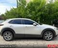 Серый Мазда CX-30, объемом двигателя 2 л и пробегом 4 тыс. км за 26999 $, фото 1 на Automoto.ua