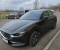 Серый Мазда CX-30, объемом двигателя 2 л и пробегом 5 тыс. км за 19900 $, фото 3 на Automoto.ua
