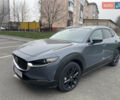 Серый Мазда CX-30, объемом двигателя 2.49 л и пробегом 32 тыс. км за 25999 $, фото 1 на Automoto.ua