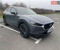 Серый Мазда CX-30, объемом двигателя 2.49 л и пробегом 32 тыс. км за 25999 $, фото 1 на Automoto.ua
