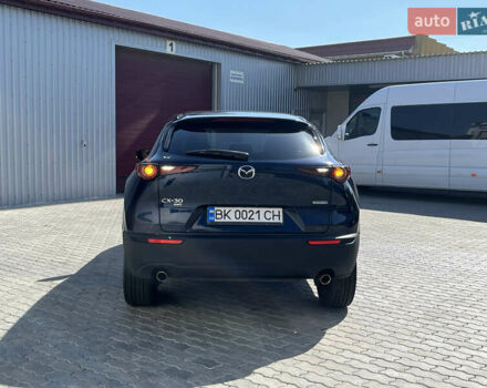 Синий Мазда CX-30, объемом двигателя 2.49 л и пробегом 133 тыс. км за 20000 $, фото 90 на Automoto.ua