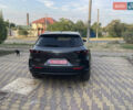 Серый Мазда CX-50, объемом двигателя 2.5 л и пробегом 57 тыс. км за 26500 $, фото 1 на Automoto.ua