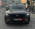 Серый Мазда CX-50, объемом двигателя 2.5 л и пробегом 27 тыс. км за 26990 $, фото 1 на Automoto.ua