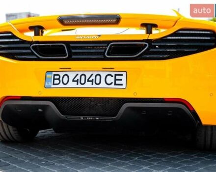 Желтый МакЛарен МП4, объемом двигателя 3.8 л и пробегом 26 тыс. км за 150000 $, фото 5 на Automoto.ua