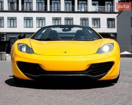 Желтый МакЛарен МП4, объемом двигателя 3.8 л и пробегом 26 тыс. км за 150000 $, фото 1 на Automoto.ua