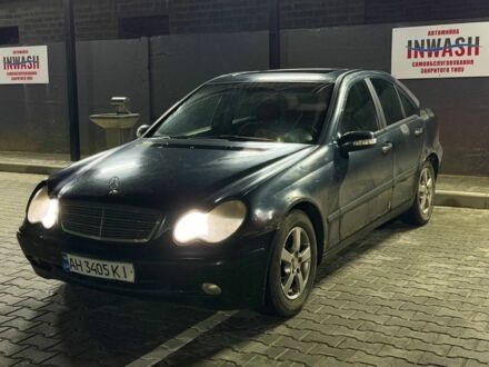 Черный Мерседес 190, объемом двигателя 2 л и пробегом 160 тыс. км за 2100 $, фото 1 на Automoto.ua