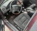 Красный Мерседес 190, объемом двигателя 1.8 л и пробегом 200 тыс. км за 1750 $, фото 3 на Automoto.ua