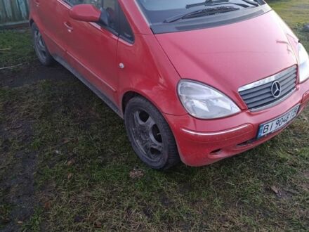 Красный Мерседес 190, объемом двигателя 1.9 л и пробегом 293 тыс. км за 3000 $, фото 1 на Automoto.ua