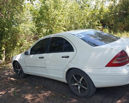 Білий Мерседес 200, об'ємом двигуна 2 л та пробігом 280 тис. км за 1894 $, фото 3 на Automoto.ua