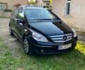Чорний Мерседес 200, об'ємом двигуна 2 л та пробігом 250 тис. км за 6800 $, фото 1 на Automoto.ua