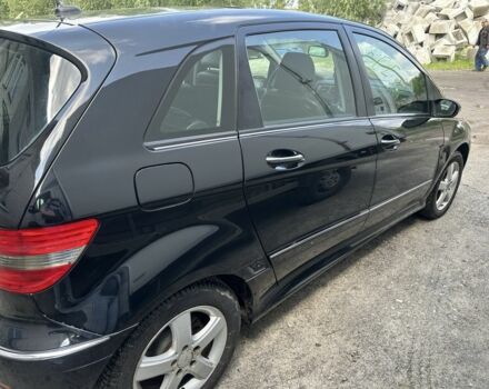 Черный Мерседес 200, объемом двигателя 2 л и пробегом 310 тыс. км за 6300 $, фото 1 на Automoto.ua