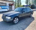 Чорний Мерседес 200, об'ємом двигуна 2 л та пробігом 327 тис. км за 3600 $, фото 1 на Automoto.ua