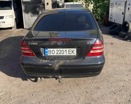 Черный Мерседес 200, объемом двигателя 2.2 л и пробегом 250 тыс. км за 3800 $, фото 1 на Automoto.ua