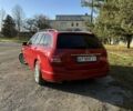 Красный Мерседес 200, объемом двигателя 2.1 л и пробегом 300 тыс. км за 11000 $, фото 1 на Automoto.ua